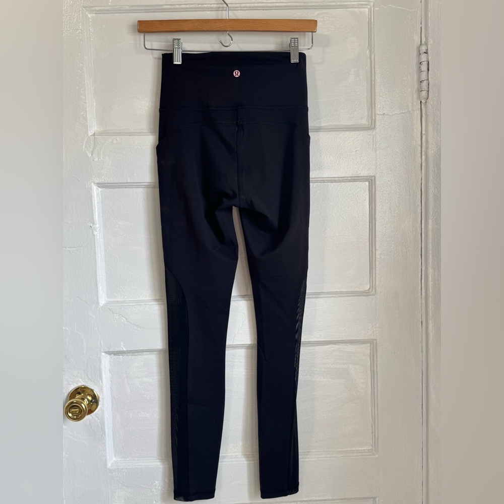 lululemon leggings size 6, black, mesh detail on the side calves, pockets